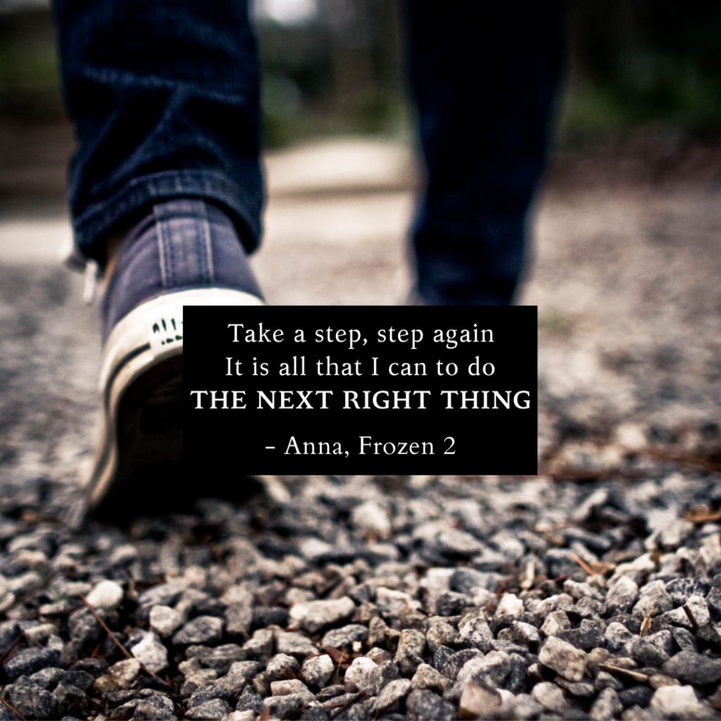 Back of shoes walking with quote "Take a step, step again It is all that I can to do the next right thing" - Anna, Frozen 2